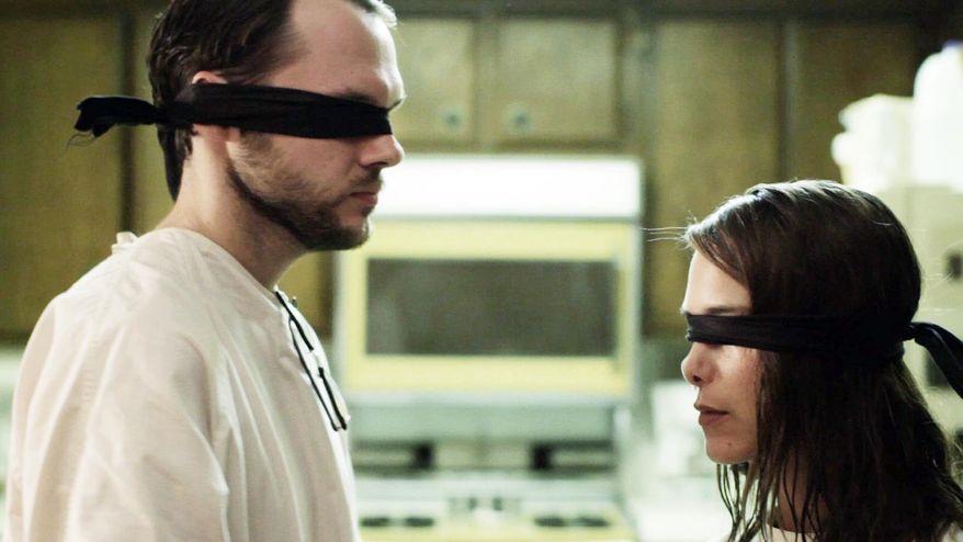 Chris Denham and Nicole Vicius co-star in "Sound of my Voice," a sci-fi film involving infiltrating a cult. (Fox Searchlight)