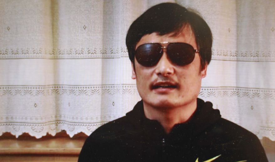In this image made from video, blind legal activist Chen Guangcheng is seen on a video posted to YouTube Friday, April 27, 2012, by overseas Chinese news site Boxun.com. "I am now free. But my worries have not ended yet," Chen said in the video that was recorded this week and that activists sent Friday to Boxun.com. (AP Photo/Boxun.com)
