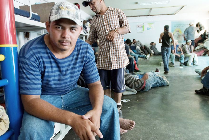 "Everything's been all right so far, but going forward, I'm afraid. Sometimes criminal guys hop on the train, and they'll rob you or kill you. ... Yeah, I'm scared." -Victor Caseres, 26, who had traveled 750 miles by hopping freight trains to arrive at the shelter (Keith Dannemiller/Special to The Washington Times)