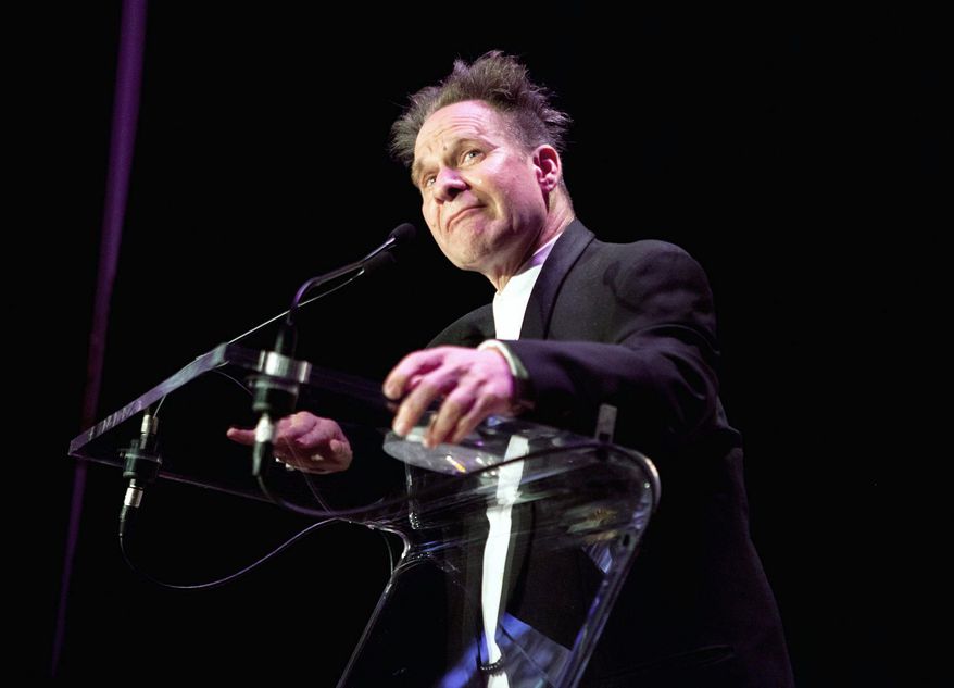 In this April 29, 2012 photo provided by Opera News, director Peter Sellars is honored at the Opera News Awards in New York, where he won a special award along with four of the world's best singers. Sellars told the guests at he "took the starch out of the Bugs Bunny version of opera" - with productions like the wrenching story of how the nuclear bomb was created in composer John Adams' Grammy award-winning "Doctor Atomic." (AP Photo/Opera News, Dario Acosta)