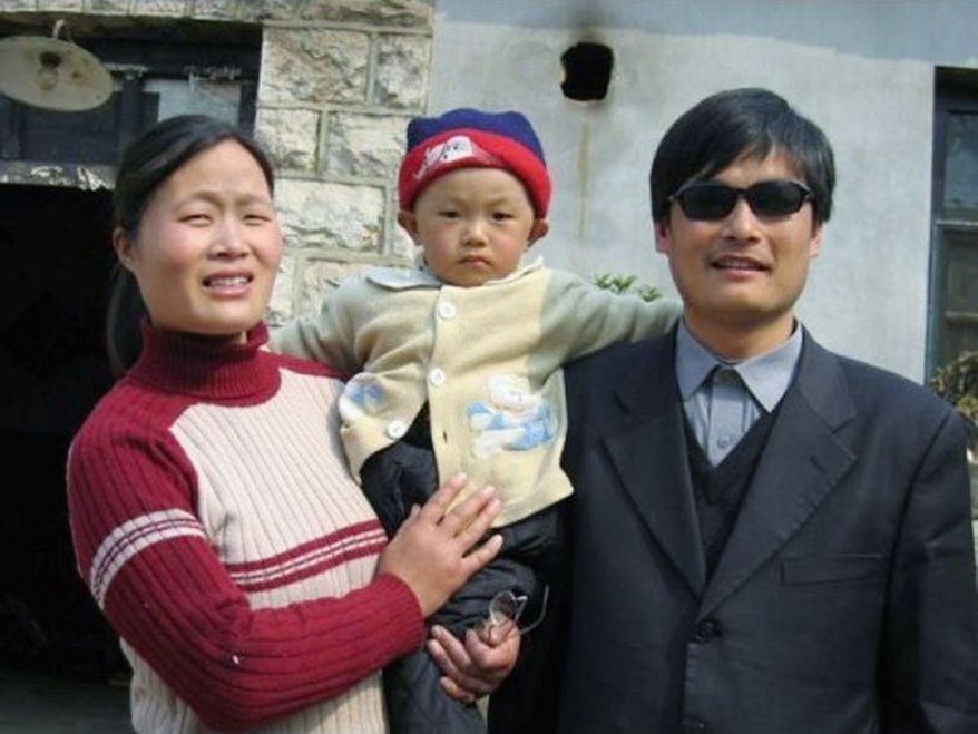 Chinese activist Chen Guangcheng is seen with his wife, Yuan Weijing, and son, Chen Kerui, in an undated photo in China. His escape from house arrest into the reported protection of U.S. diplomats in Beijing poses a delicate U.S.-China issue. (China Aid Association via Associated Press)