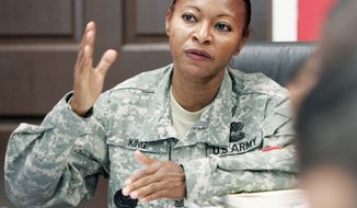 ASSOCIATED PRESS
Command Sgt. Maj. Teresa King said she still does not know what conduct of hers was being investigated by her superiors when she was suspended, but she claims her promotion to command of drill sergeant training was resented.