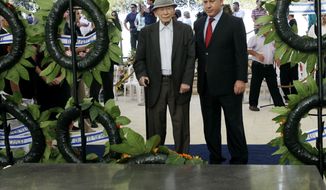 ** FILE ** Israeli Prime Minister Benjamin Netanyahu (right) and his father, Ben-Zion, attend the official memorial service for the late Zionist leader Zeev Jabotinsky on Mount Herzl in Jerusalem in July 2010. (AP Photo/Kobi Gideon, Pool)