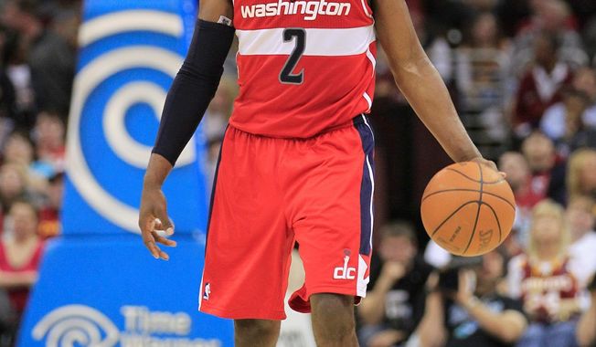 Point guard John Wall is the building block the Wizards must complement if they want to transition from NBA laughingstock to playoff contender. (Associated Press)