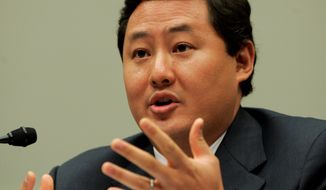 John Yoo, the former Justice lawyer who wrote the so-called &quot;torture memos,&quot; is protected from lawsuits, the 9th U.S. Circuit Court of Appeals ruled. (Associated Press)