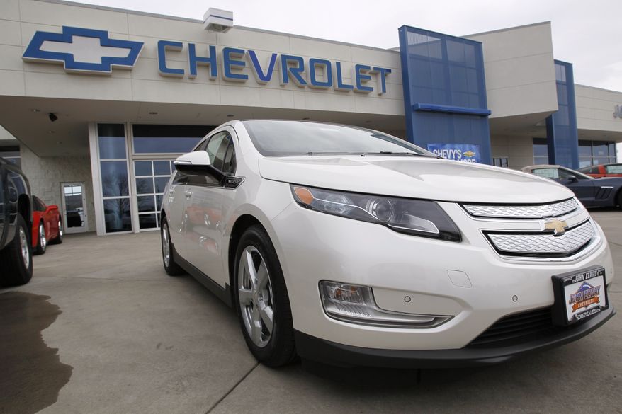A 2012 Chevrolet Volt is on display outside a Chevy dealership in the south Denver suburb of Englewood, Colo., on Sunday, Feb. 19, 2012. (AP Photo/David Zalubowski)