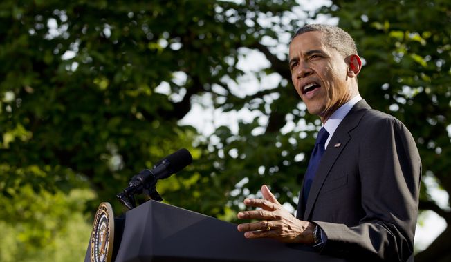 President Barack Obama speaks at a celebration of Cinco de Mayo in the Rose Garden of the White House in Washington, Thursday, May 3, 2012. (AP Photo/Carolyn Kaster)