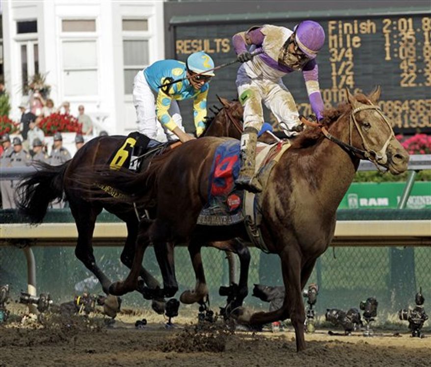 Jockey Mario Gutierrez rides I'll Have Another to victory past Bodemeister ridden by Mike Smith (6) to victory in the 138th Kentucky Derby horse race at Churchill Downs Saturday, May 5, 2012, in Louisville, Ky. (AP Photo/Mark Humphrey)