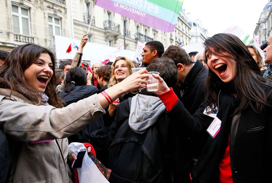 Supporters of Mr. Hollande celebrate with champagne after results of the second round of the French presidential election were announced Sunday. The party outside Socialist Party headquarters in Paris. "Austerity can no longer be inevitable," Mr. Hollande declared in his victory speech Sunday night, referring to Mr. Sarkozy's push for belt-tightening to fight persistent unemployment and rising national debt. (Associated Press)