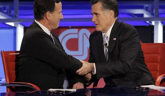 ** FILE ** In this Feb. 22, 2012, photo Republican presidential candidate and former Massachusetts Gov. Mitt Romney, right, talks with fellow candidate, former Pennsylvania Sen. Rick Santorum, after a presidential debate in Arizona. On Monday night, May 7, 2012, Santorum endorsed Romney, saying &quot;above all else&quot; they agree that Obama must be defeated. (AP Photo/Jae C. Hong, File)