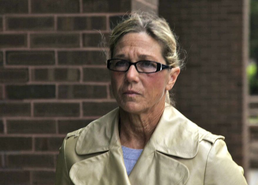 Rita Crundwell, former comptroller of Dixon, Ill., leaves federal court in Rockford, Ill., on Monday, May 7, 2012, after pleading not guilty at her arraignment to a single charge of wire fraud. (AP Photo/Robert Ray)