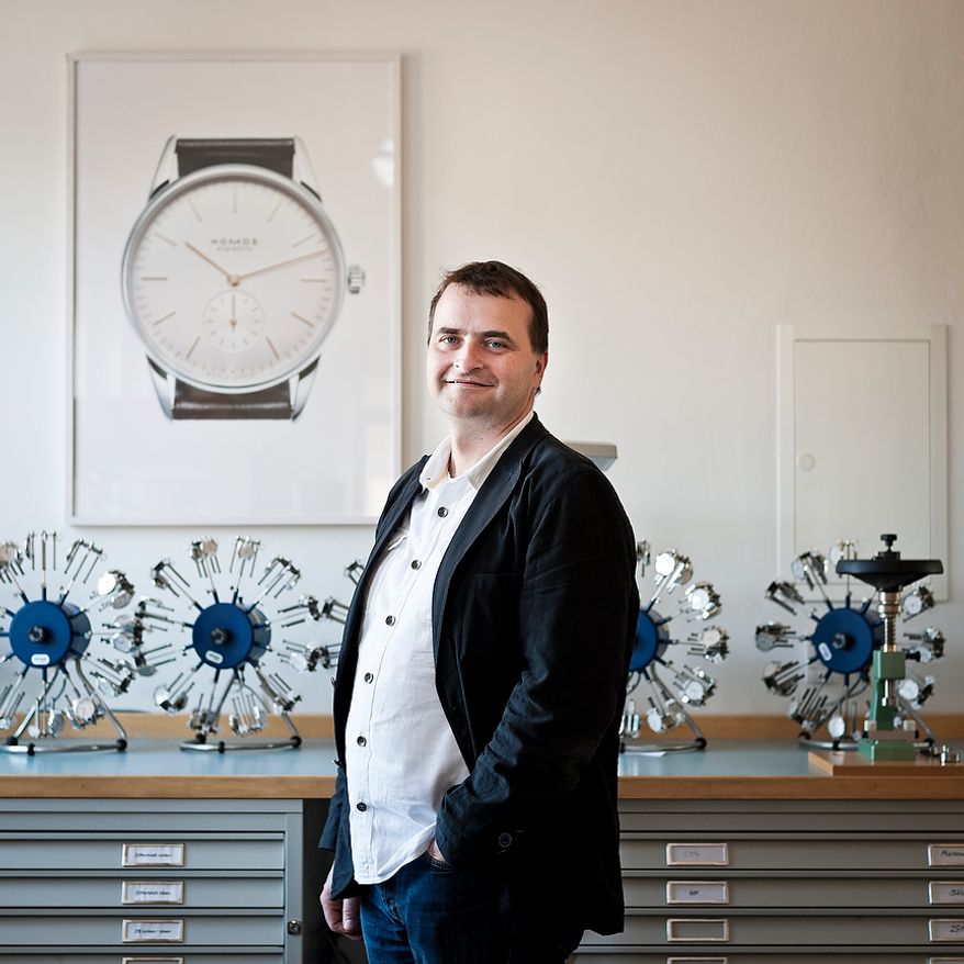 Portrait of Uwe Ahrendt, CEO of the German watch manufacturer Nomos Glashutte, standing in the final inspection room inside the timepiece manufactory (the so called "Chronometrie") on Thursday, May 26, 2012. Before the watches will be dispatched, they are tested on watch-winders. Christian Burkert/Special to The Washington Times.