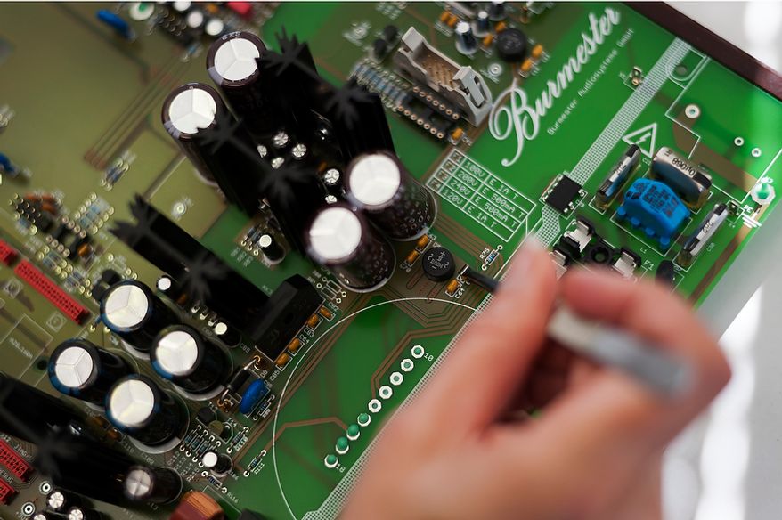 Manual assembly of a motherboard with components of a cd player Burmester 102.
Burmester Audiosysteme was founded in 1977 and has since been producing top-range high end products in their Berlin manufacture.
Daniel Pilar/Special to The Washington Times