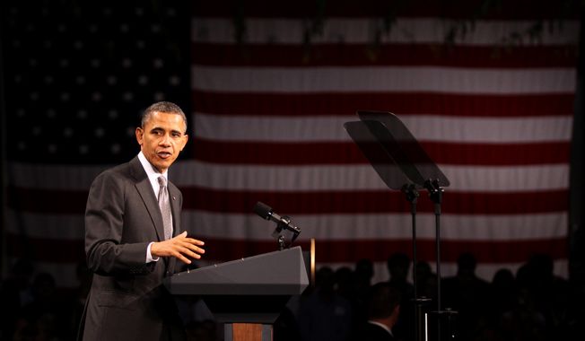 President Obama speaks at the State University of New York&#x27;s Nano-Tech complex in Albany, N.Y., on Tuesday, May 8, 2012. (AP Photo/Daily Gazette, Patrick Dodson)