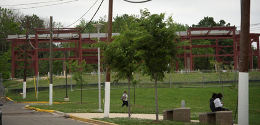 This is a view of a portion of the Department of Labor construction project at the Potomac Jobs Corps Center, seen from Success Avenue SW, in Washington, D.C., Monday, May 7, 2012. The project was supposed to be finished by now, but is months behind schedule and has jumped in costs from $5.5 million to $8.2 million. (Rod Lamkey Jr./The Washington Times)