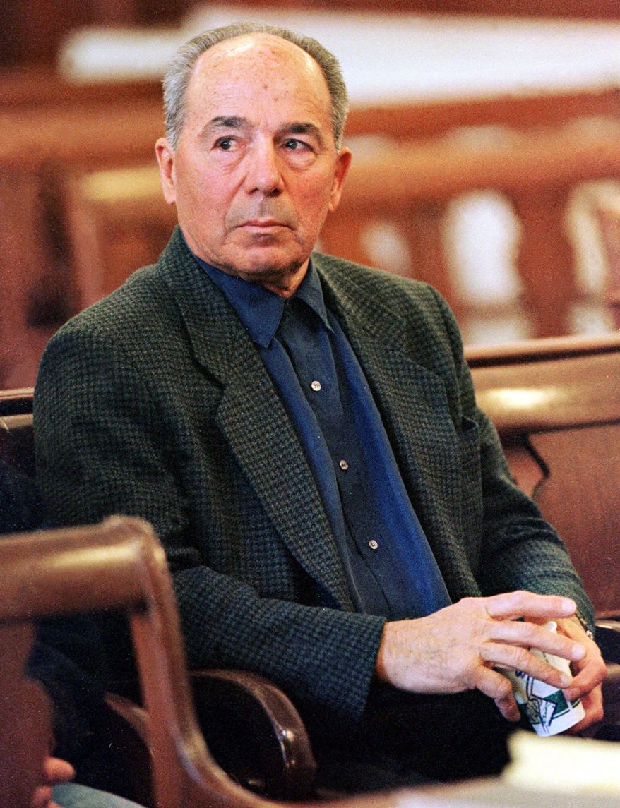 **FILE** Louis "Baby Shacks" Manocchio listens April 12, 1999, during his trial at Providence Superior Court in Providence, R.I. (Associated Press)