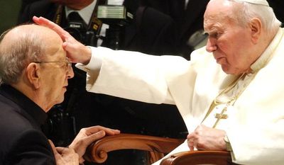**FILE** Pope John Paul II gives his blessing to father Marcial Maciel, founder of Christ&#39;s Legionaries, on Nov. 30, 2004, at the Vatican. (Associated Press)