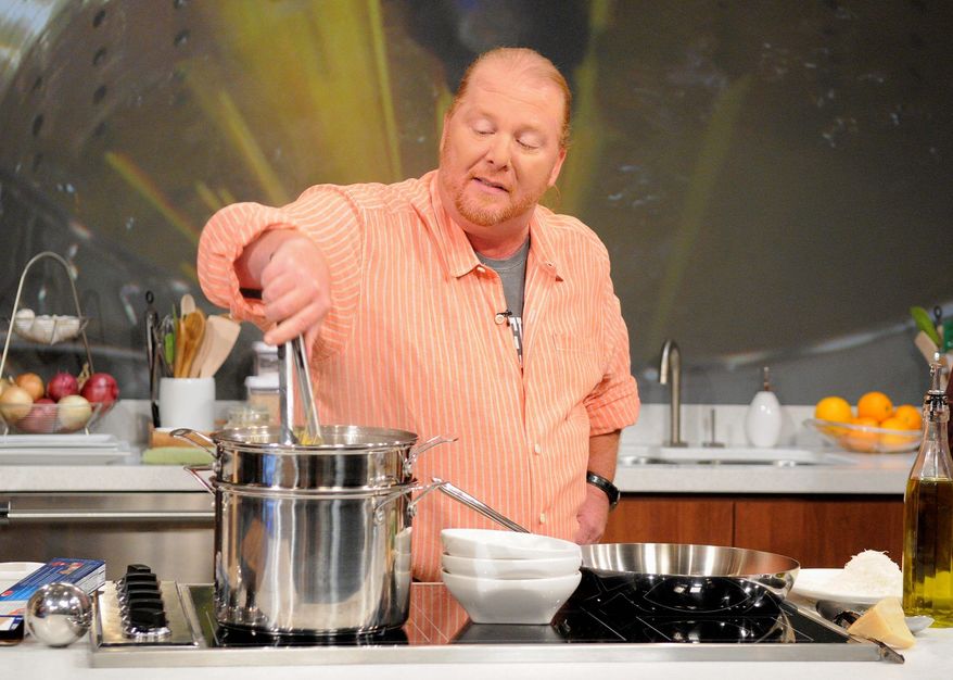 Chef Mario Batali, co-host of the daytime talk show "The Chew," is participating in a food stamp challenge, which provides $31 per person for a week. (ABC via Associated Press)