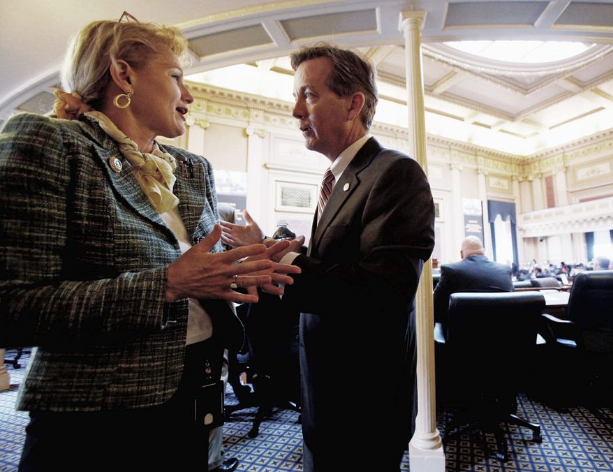 ASSOCIATED PRESS
Delegate S. Chris Jones speaks Monday with House Appropriations Committee staff member Susan Hogge. After a budget amendment proposed by Gov. Bob McDonnell was rejected, Mr. Jones suggested it was "inartfully drawn."