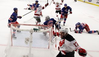 associated press
Ilya Kovalchuk (17) celebrated after opening the scoring in New Jersey&#39;s 3-2 win over the New York Rangers in Game 2 on Wednesday night. It was a bounce-back for the Devils, who were shut out in Game 1.