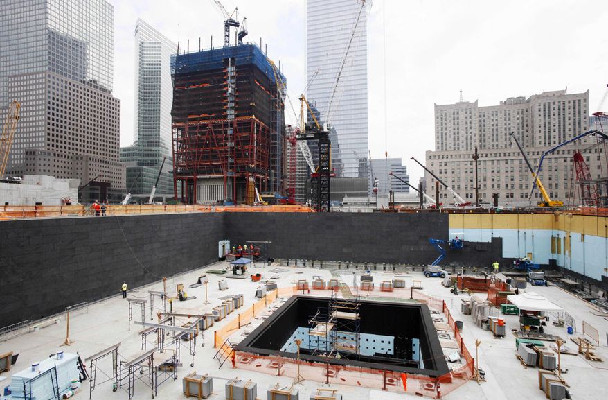 Construction continues Aug. 10, 2010, on the National September 11 Memorial and Museum in New York. (Associated Press)