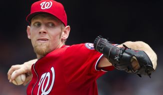 Washington Nationals starting pitcher Stephen Strasburg throws during the first inning of a baseball game against the Baltimore Orioles in Washington, Sunday, May 20, 2012. (AP Photo/Manuel Balce Ceneta)
