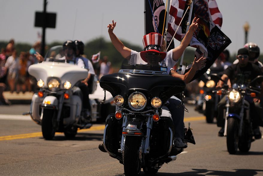 The 21st Rolling Thunder takes place around 22nd Street and Constitution Avenue in NW Washington, D.C., Sunday, May 25, 2008. Thousands of motor cyclists, most of them war veterans, depart their gathering place at the Pentagon parking lot for the ride through Virginia and Washington, DC to the Vietnam VeteranÕs Memorial. Rolling Thunder is an annual motorcycle rally held in Washington, DC during the Memorial Day weekend. About 400,000 veterans roar across Washington, DC on their motorcycles as a tribute to American war heroes and to call for the government's recognition and protection of Prisoners of War (POWs) and those Missing in Action (MIAs). (Astrid Riecken/The Washington Times)