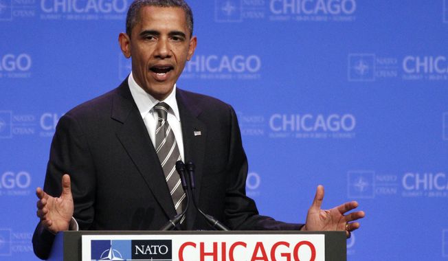 President Obama speaks at a news conference at the NATO summit in Chicago on Monday, May 21, 2012. (AP Photo/Kiichiro Sato)