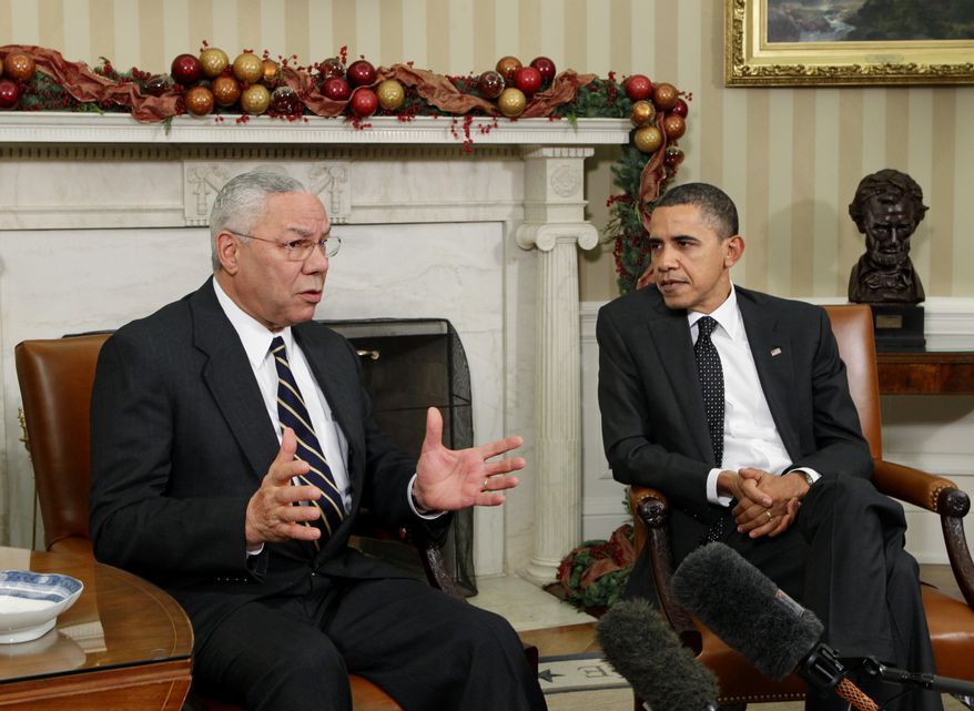 ** FILE ** Colin Powell, a secretary of state in the George W. Bush administration and a former chairman of the Joint Chiefs of Staff, meets with President Obama in the Oval Office at the White House in Washington in December 2010. (AP Photo/J. Scott Applewhite)