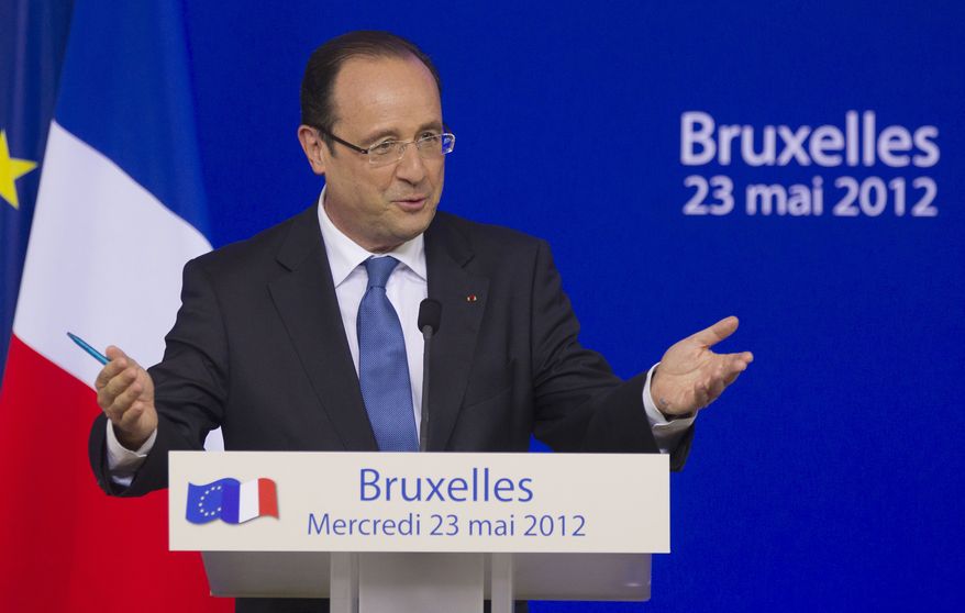 French President Francois Hollande speaks to the media during a press conference at a European Union summit in Brussels on Thursday, May 24, 2012. (AP Photo/Michel Euler)
