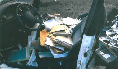A photograph provided to the D.C. Office of the Inspector General by the heads of the fire and police unions shows personnel files found in an abandoned car at the D.C. fire training academy.