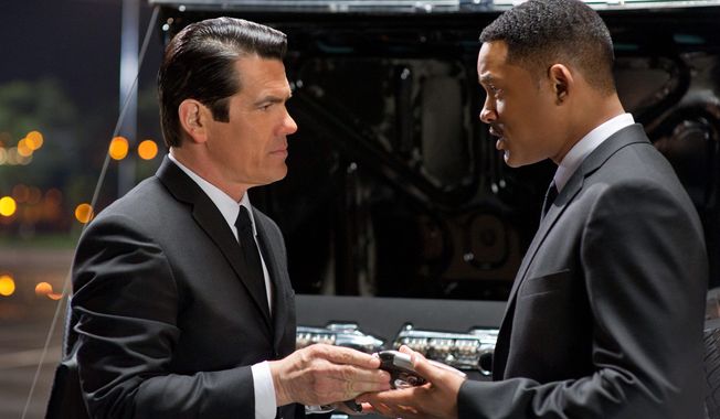 In this film image released by Sony Pictures, Josh Brolin, left, and Will Smith star are shown in a scene from &quot;Men in Black 3.&quot; (AP Photo/Columbia Pictures-Sony, Wilson Webb) 