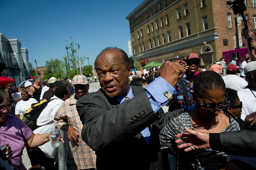 People waiting in line in the heat cheer the arrival of Council Member Marion Barry (Ward 8) as he arrives to view the body of Chuck Brown as he lies in repose at the Howard Theatre in Washington, D.C., Tuesday, May 29, 2012. Mr. Brown died on May 16, 2012. He was 75.(Rod Lamkey Jr/The Washington Times)