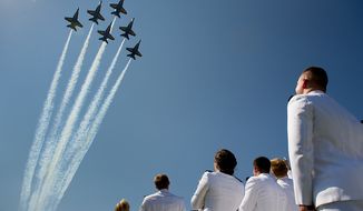 **FILE** The U.S. Navy&#39;s Blue Angels fly over the graduation ceremony for the U.S. Navy Academy&#39;s class of 2012 at the Navy-Marine Corps Stadium, Annapolis, Md., on May 29, 2012. (Andrew Harnik/The Washington Times)