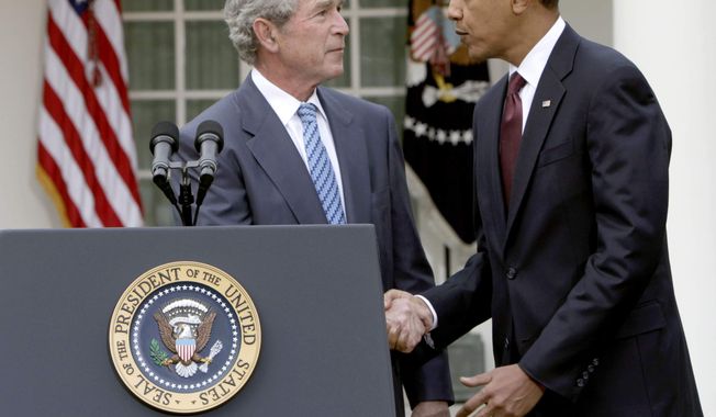 ** FILE ** President Obama shakes hands with former President George W. Bush in the Rose Garden at the White House in Washington on Jan. 16, 2010. (AP Photo/Pablo Martinez Monsivais)
