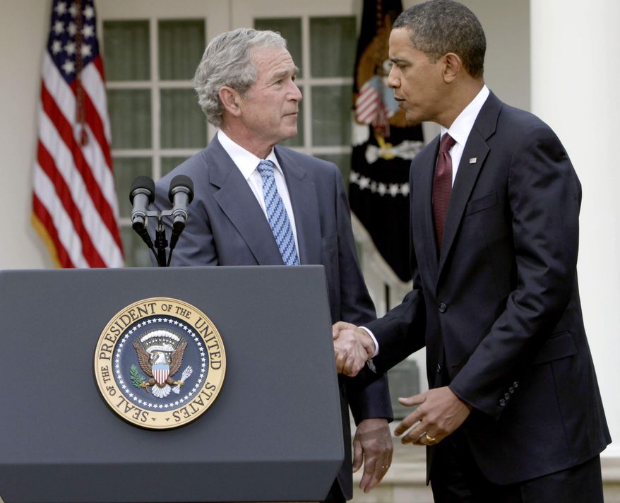 ** FILE ** President Obama shakes hands with former President George W. Bush in the Rose Garden at the White House in Washington on Jan. 16, 2010. (AP Photo/Pablo Martinez Monsivais)