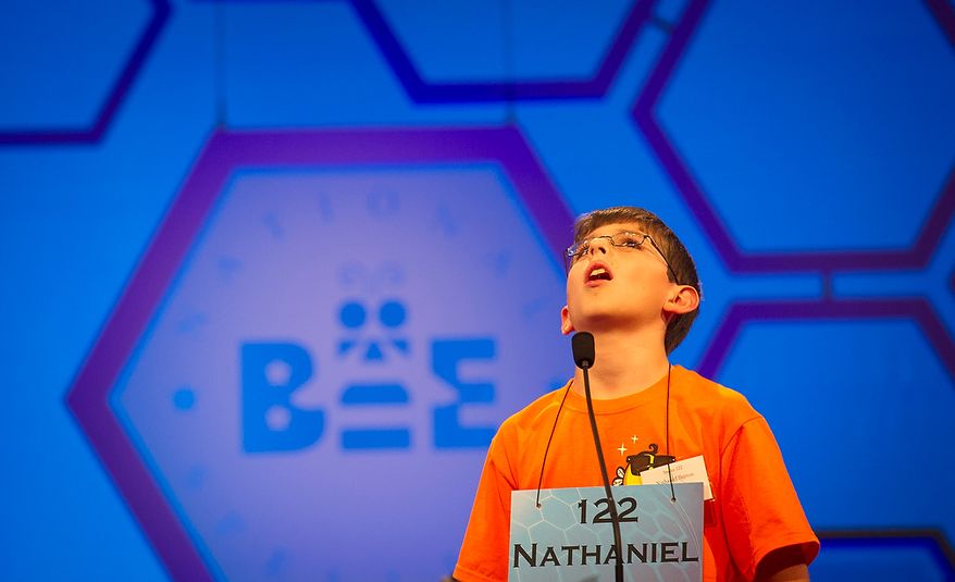 Nathaniel F. Britton, 11, of Macomb, Mich., reacts to misspelling his word during the third round of the 2012 Scripps National Spelling Bee at the Gaylord National Resort and Convention Center in National Harbor, Md., Wednesday, May 30, 2012. This year, 278 spellers from around the United States and all walks of life will compete for the title of 2012 Scripps National Spelling Bee champion. (Rod Lamkey Jr/The Washington Times)