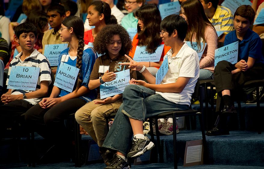 During a break due to technical difficulties, contestants Nickan Fayyazi,12, of Woodland Hills, Calif., (left) and Justin K. Chuang,13, of Diamond Bar, Calif., (right) play rock-paper-scissors during the third round of the 2012 Scripps National Spelling Bee at the Gaylord National Resort and Convention Center in National Harbor, Md., Wednesday, May 30, 2012. This year, 278 spellers from around the United States and all walks of life will compete for the title of 2012 Scripps National Spelling Bee champion. (Rod Lamkey Jr/The Washington Times)