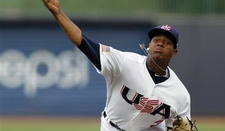Duke pitcher Marcus Stroman, shown with the United States Collegiate National Team, is a player analysts are saying could fall to the Nationals at the 16th pick in the MLB draft. (AP Photo/Jim R. Bounds)
