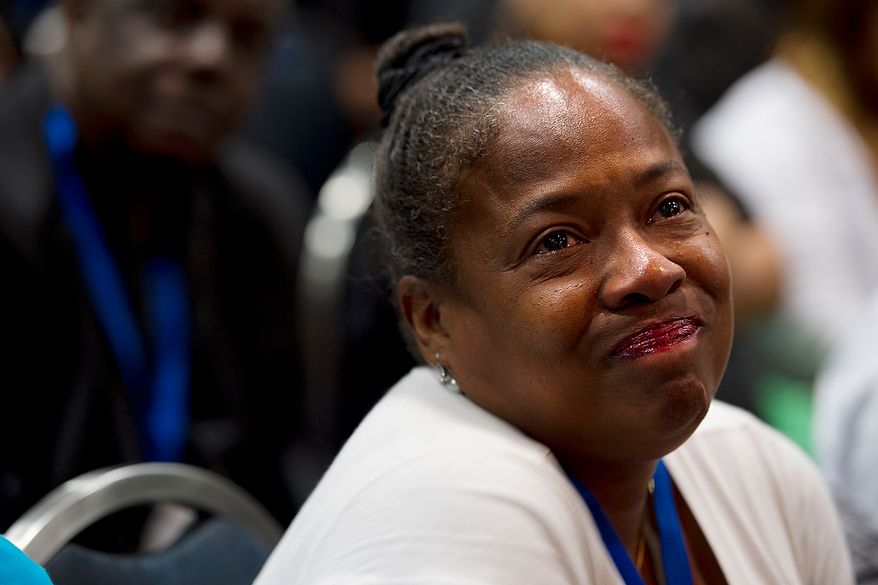 "My heart is breaking," said Gwen West, who grew up on Go Go and said Chuck Brown is the reason she got an education. She came with her best friend to the memorial service for D.C. Go Go icon Chuck Brown Thursday, May 31, 2012 at the Washington Convention Center in Washington, D.C. Thousands of people came out to say goodbye to the D.C. legend. (Barbara L. Salisbury/The Washington Times)