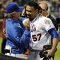 New York Mets starting pitcher Johan Santana hugs manager Terry Collins after he threw a no-hitter against the St. Louis Cardinals on Friday, June 1, 2012, at Citi Field in New York. The Mets won 8-0. (AP Photo/Kathy Kmonicek)
