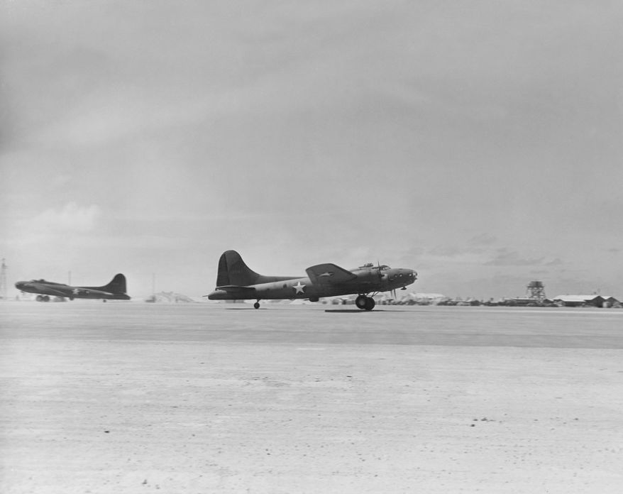 An Army Flying Fortress takes off from Midway Island, on its way to intercept and bomb the Japanese fleet on June 4, 1942. (Associated Press)
