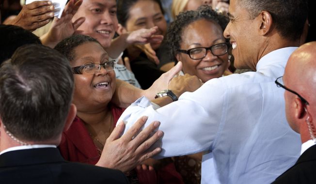 Minneapolis Superintendent of Schools Bernadeia Johnson (left) shakes hands June 1, 2012, with President Obama as he greets supporters at Honeywell Automation and Control Solutions Global Headquarters in Golden Valley, Minn., where he spoke about jobs for veterans. (Associated Press/The Star Tribune)