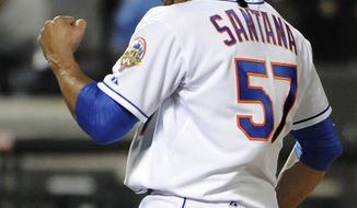 New York Mets starting pitcher Johan Santana celebrates his no-hitter against the St. Louis Cardinals on Friday, June 1, 2012, at Citi Field in New York. The Mets won 8-0. (AP Photo/Kathy Kmonicek)
