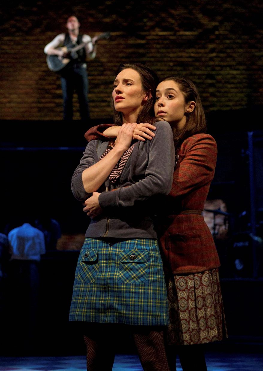 Elizabeth A. Davis (left) and Cristin Milioti perform a scene from the musical "Once," which won four Drama Desk Awards on Sunday, including one for best musical. It is nominated for 11 Tonys. (Boneau/Bryan-Brown, Joan Marcus via Associated Press)