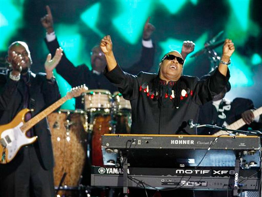 Stevie Wonder performs at the Queen's Jubilee Concert in front of Buckingham Palace, London, Monday, June 4, 2012. The concert is a part of four days of celebrations to mark the 60 year reign of Britain's Queen Elizabeth II. (AP Photo/Joel Ryan)