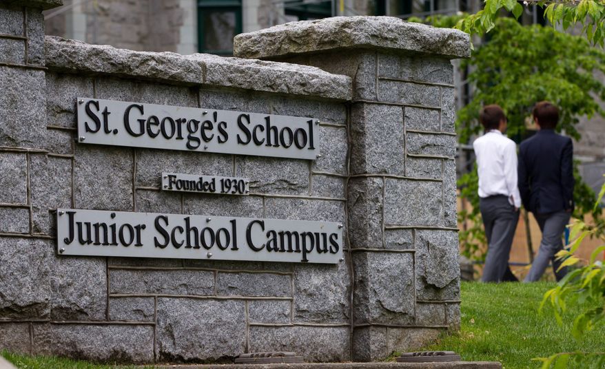 Students walk outside St. George's School after a human foot was delivered to the school earlier in the day in Vancouver, British Columbia, on June 5, 2012. A human hand was also delivered to another Vancouver school that day. (Associated Press/The Canadian Press)