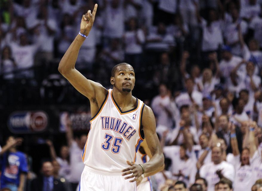 Oklahoma City Thunder small forward Kevin Durant (35) reacts against the San Antonio Spurs during the second half of Game 6 in the NBA basketball Western Conference finals, Wednesday, June 6, 2012, in Oklahoma City. (AP Photo/Sue Ogrocki)