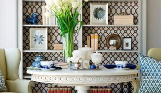Photo by Angie Seckinger
Marika Meyer of Marika Meyer Interiors in the District, suggests using fabric or wallpaper in the back of a bookcase to add interest.