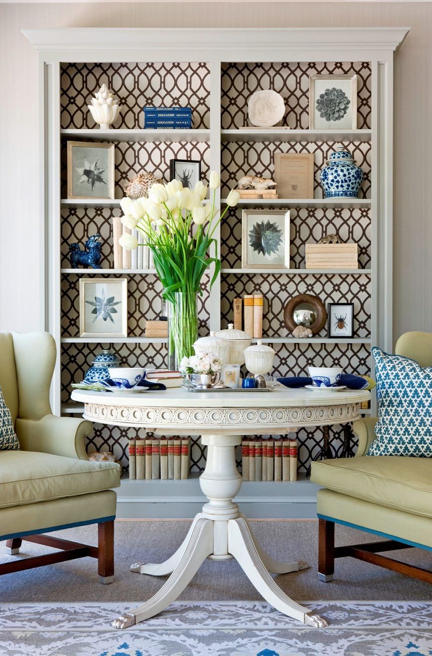 Photo by Angie Seckinger
Marika Meyer of Marika Meyer Interiors in the District, suggests using fabric or wallpaper in the back of a bookcase to add interest.